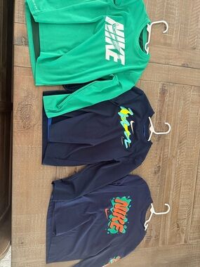 Nike Navy Long-Sleeve Graphic Tee with Neon Accents